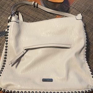 Jessica Simpson over the shoulder purse